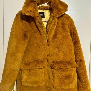 Barney’s fluffy shearling jacket